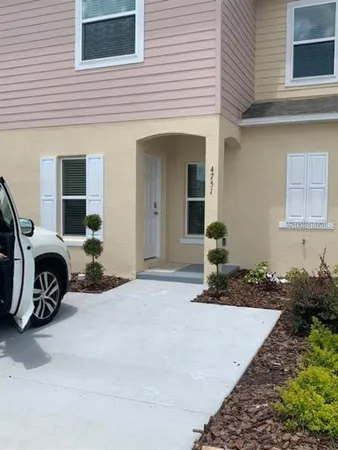 a view of a house with a patio