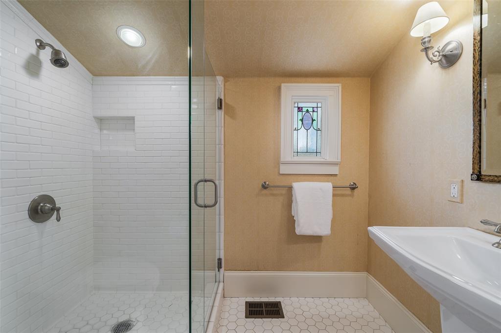 2315 Routh Street Dallas, TX 75201 - Photo 25 of 38 a bathroom with a shower