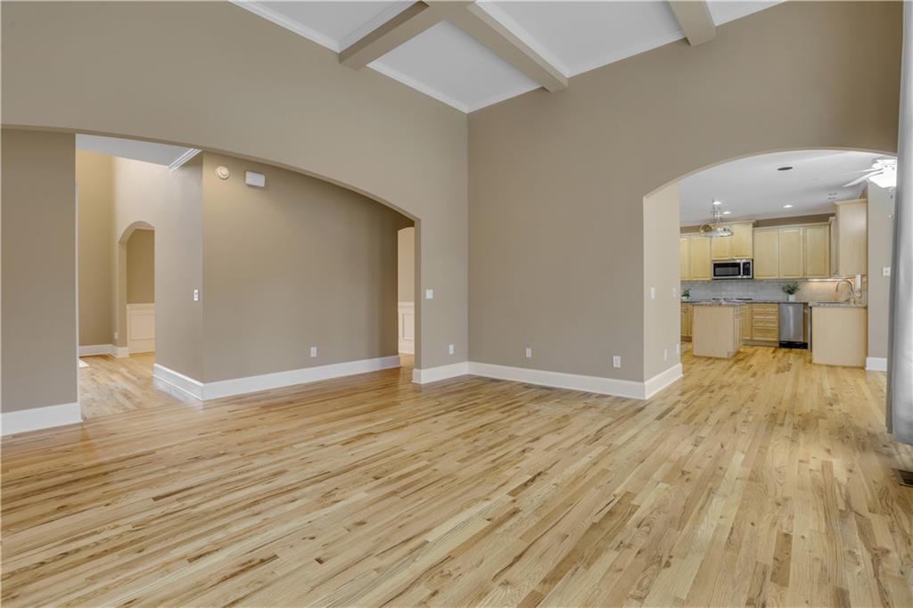 803 Rocky Ridge Court Canton, GA 30114 - Photo 12 of 80 a view of a living room a room with wooden floor and furniture