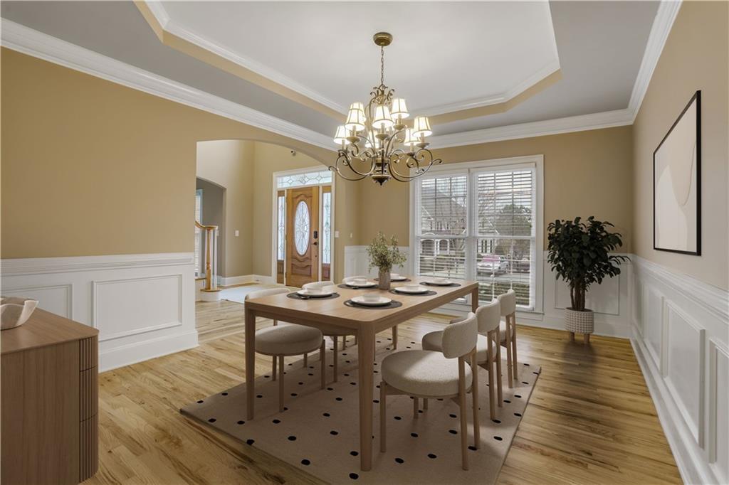 803 Rocky Ridge Court Canton, GA 30114 - Photo 22 of 80 a view of a dining room with furniture and wooden floor