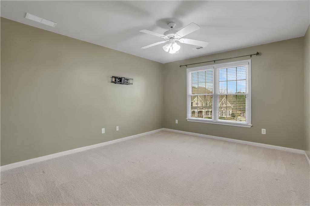 803 Rocky Ridge Court Canton, GA 30114 - Photo 43 of 80 a view of an empty room with a window