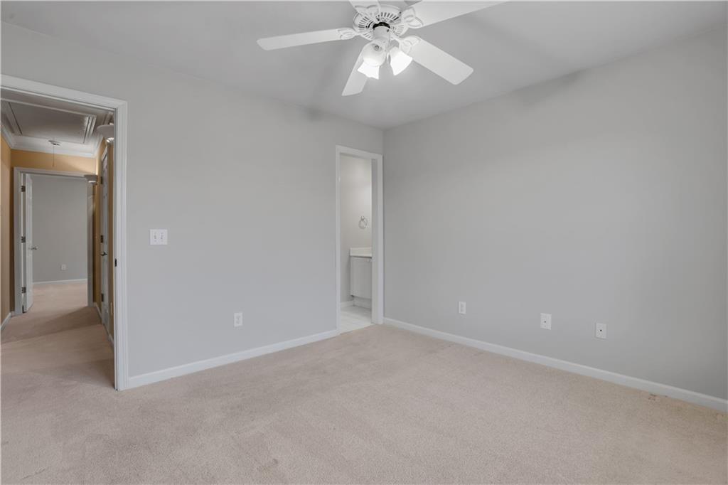 803 Rocky Ridge Court Canton, GA 30114 - Photo 47 of 80 a view of an empty room with a fan
