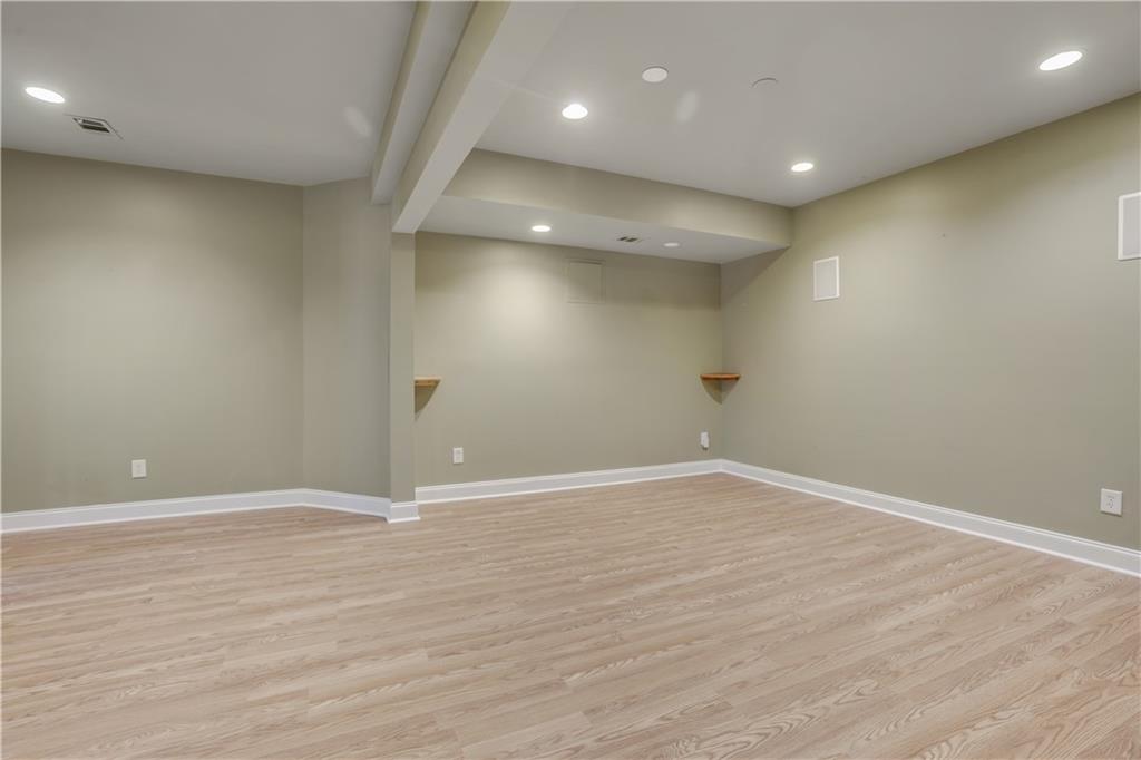 803 Rocky Ridge Court Canton, GA 30114 - Photo 56 of 80 an empty room with wooden floor and windows