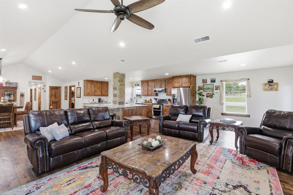 187 County Road 4195 Decatur, TX 76234 - Photo 10 of 40 a living room with furniture and a wooden floor