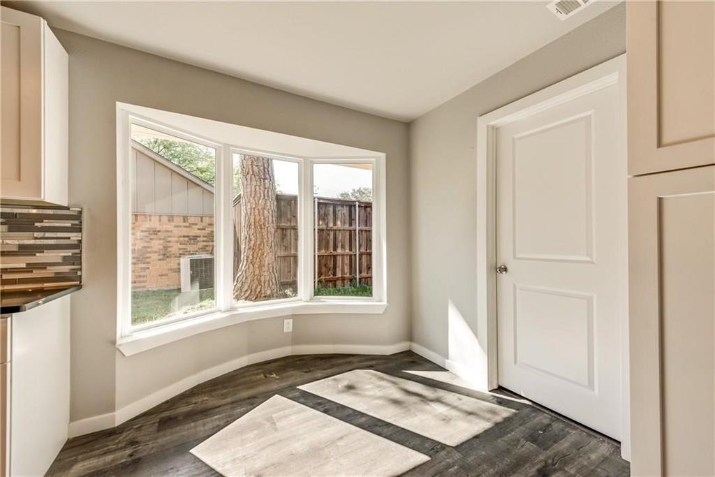 10216 Carry Back Circle Dallas, TX 75229 - Photo 9 of 28 a view of an empty room with a window