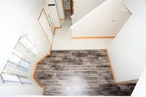 a kitchen with stainless steel appliances granite countertop a sink a stove and a refrigerator