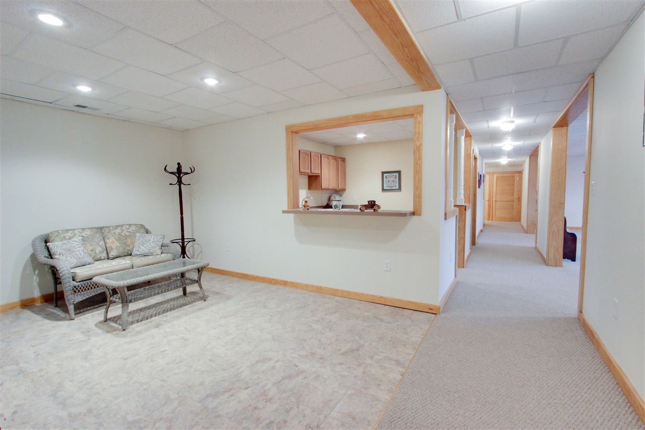 713 Lantz Road Edinburg, VA 22824 - Photo 22 of 27 a view of a livingroom with furniture and a window