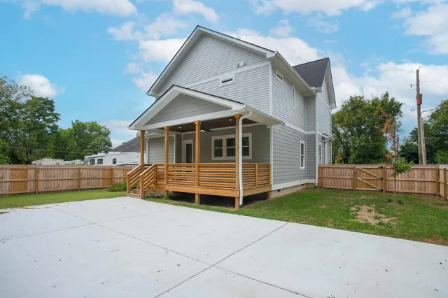 a front view of a house with swing