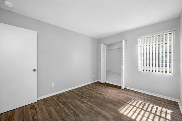 a view of an empty room and window