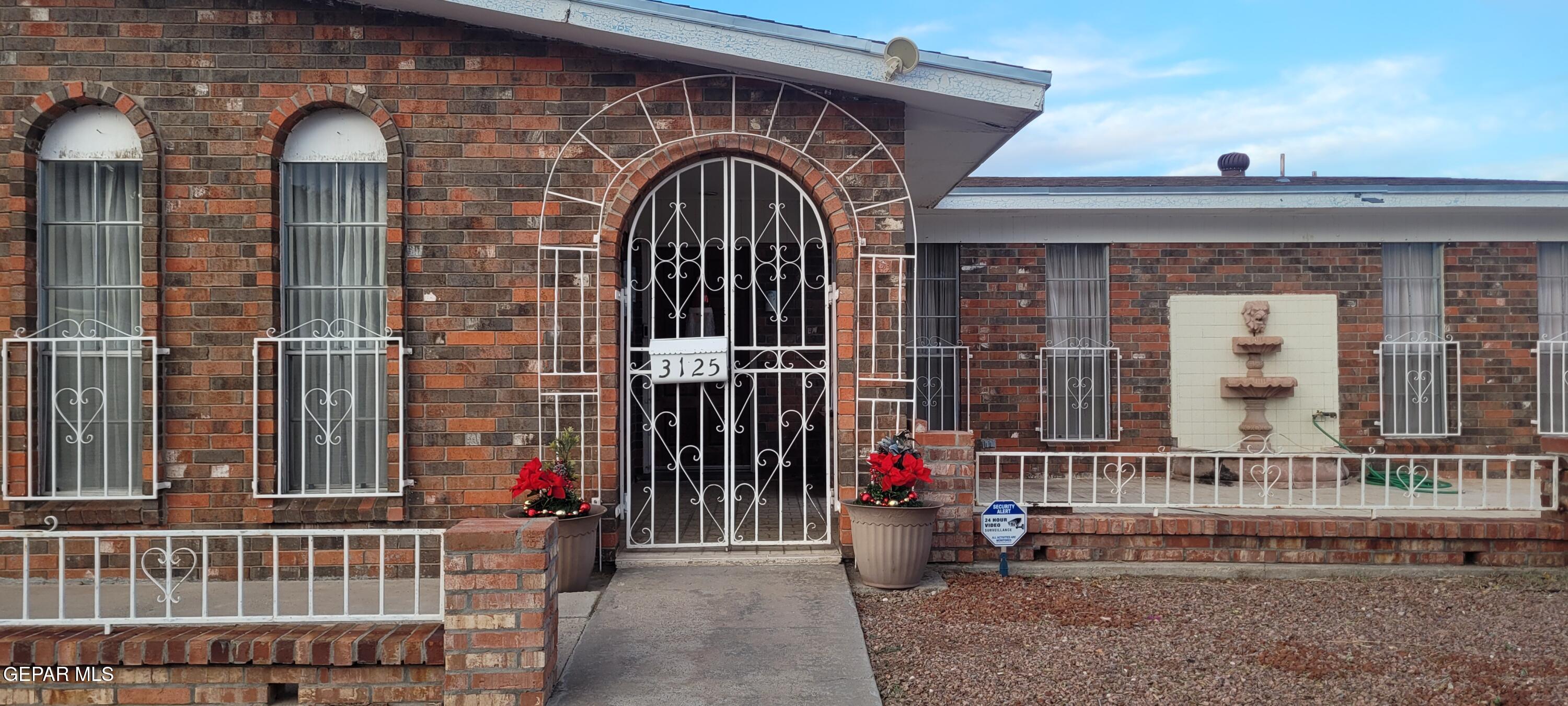 3125 Stone Edge Road El Paso, TX 79904 - Photo 3 of 18 front view of a house with a porch