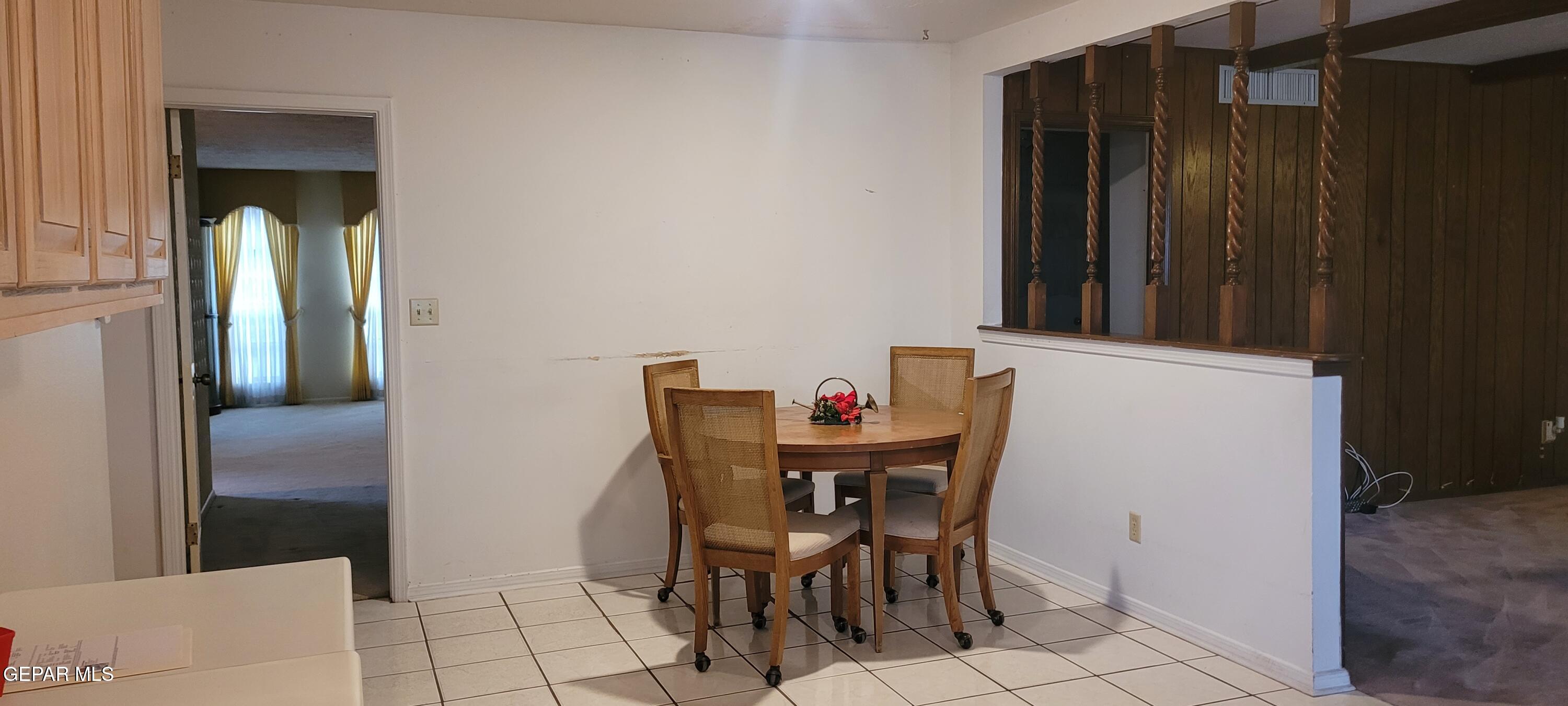 3125 Stone Edge Road El Paso, TX 79904 - Photo 4 of 18 a view of a dining room with furniture