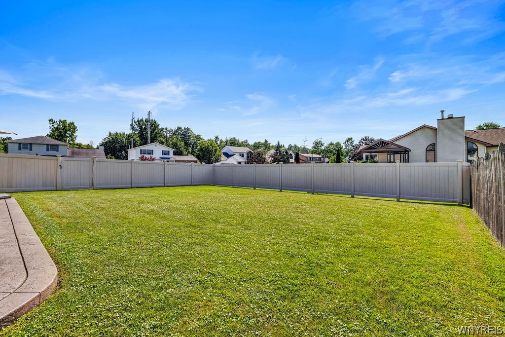 7034 Walmore Road Wheatfield, NY 14304 - Photo 32 of 33 Enormous fully fenced yard