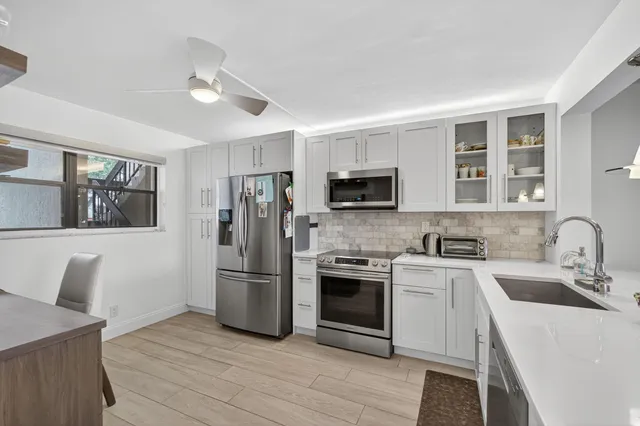 $359,000 | 12870 Briarlake Drive, Unit 106, Palm Beach Gardens, FL 33418