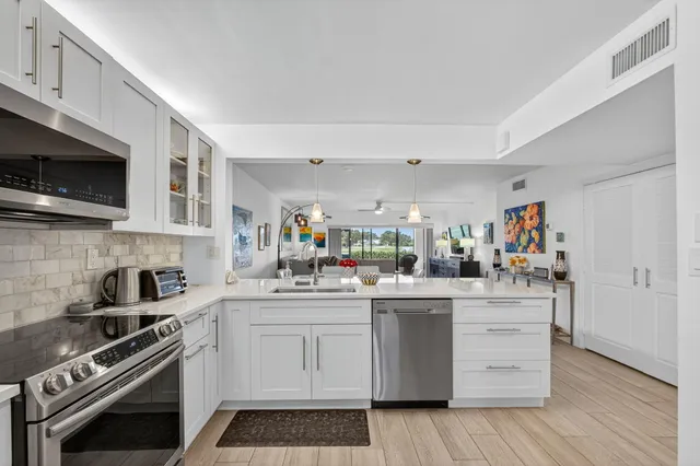 $359,000 | 12870 Briarlake Drive, Unit 106, Palm Beach Gardens, FL 33418