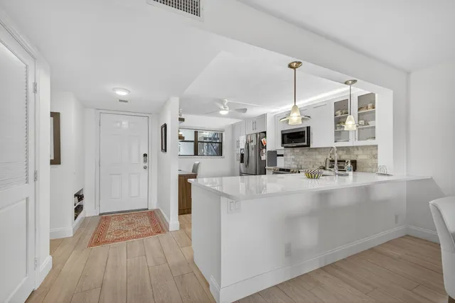 $359,000 | 12870 Briarlake Drive, Unit 106, Palm Beach Gardens, FL 33418