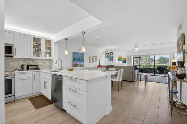 $359,000 | 12870 Briarlake Drive, Unit 106, Palm Beach Gardens, FL 33418