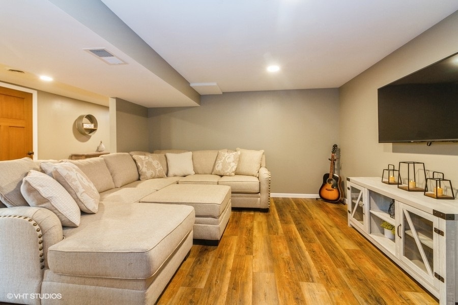 5602 Pagles Road Harvard, IL 60033 - Photo 12 of 23 a living room with furniture and a flat screen tv