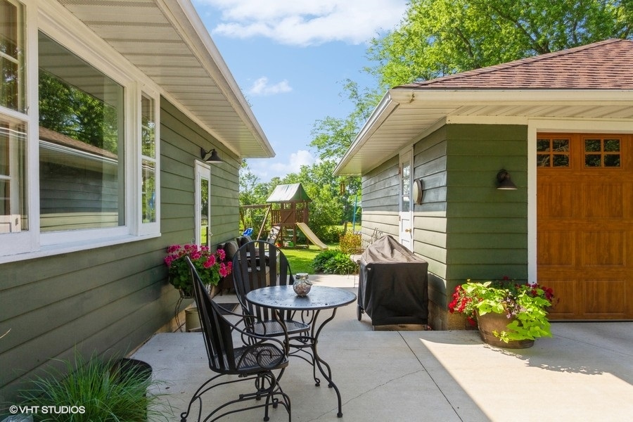 5602 Pagles Road Harvard, IL 60033 - Photo 18 of 23 a view of a chairs and table in a patio