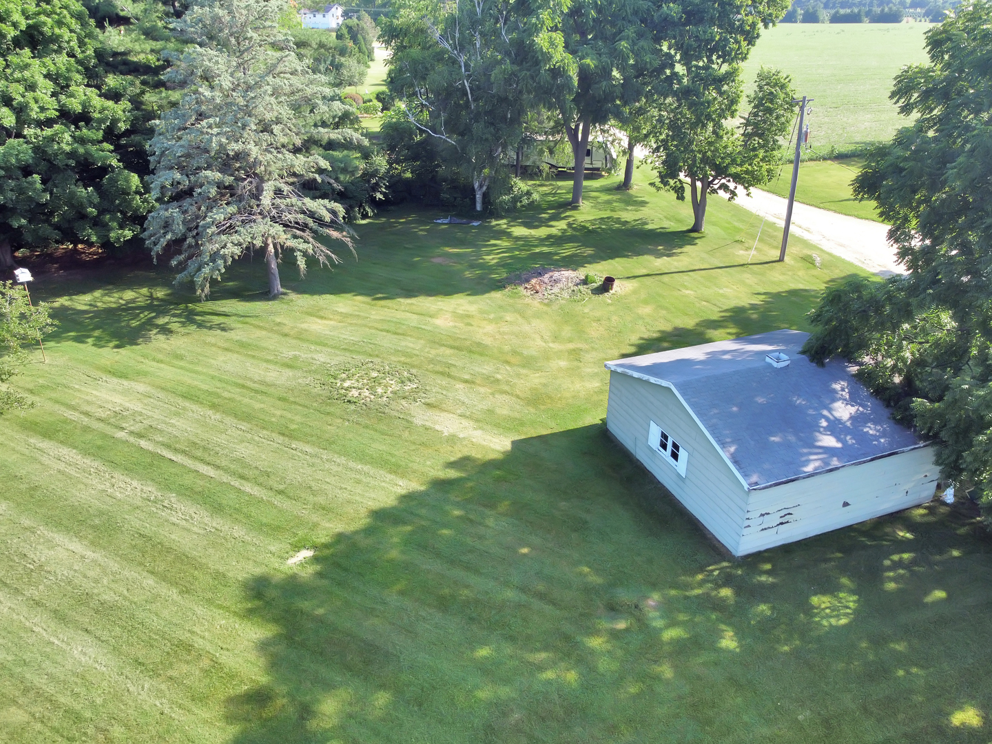 5602 Pagles Road Harvard, IL 60033 - Photo 21 of 23 a view of a big yard with swimming pool