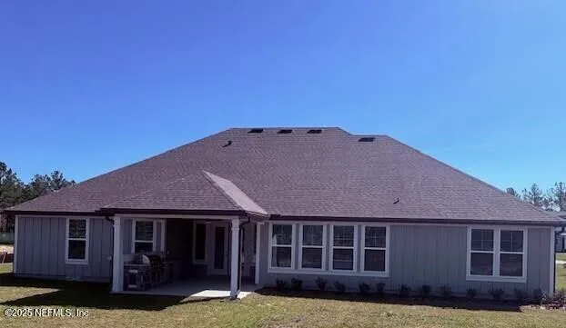a house view with a garden space