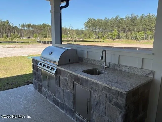 a terrace with a table and chairs