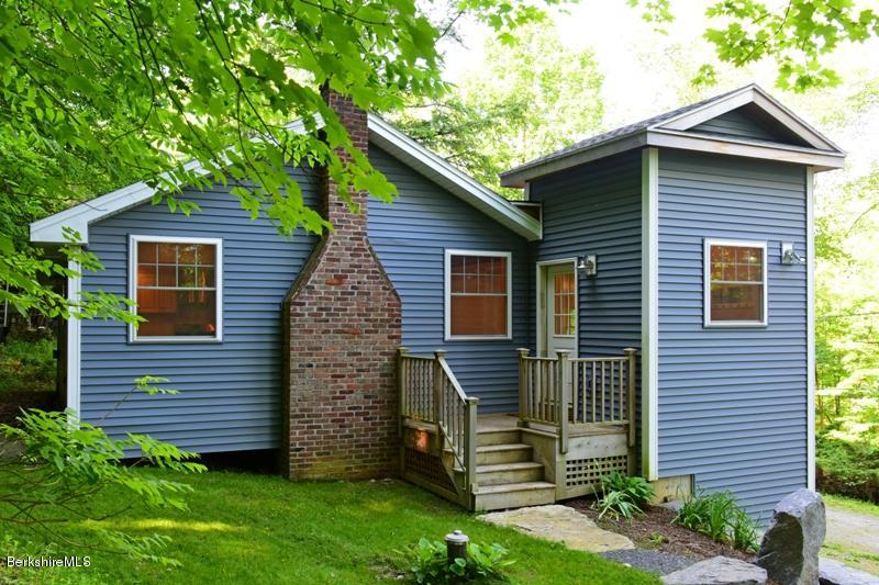 16 Mahkeenac Road Stockbridge, MA 01262 - Photo 1 of 26 a front view of a house with garden