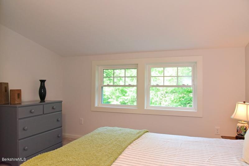 16 Mahkeenac Road Stockbridge, MA 01262 - Photo 21 of 26 a bedroom with a bed and a window