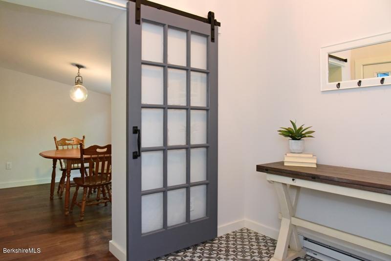 16 Mahkeenac Road Stockbridge, MA 01262 - Photo 7 of 26 a view of a livingroom with furniture and workspace