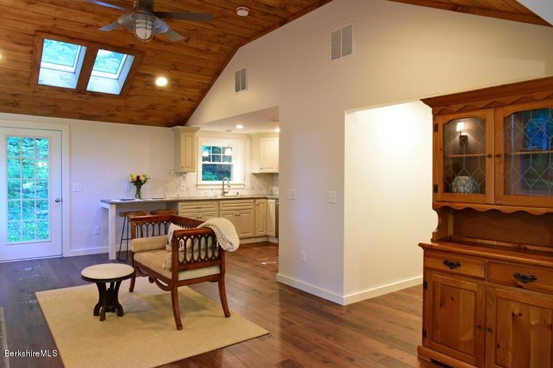 16 Mahkeenac Road Stockbridge, MA 01262 - Photo 8 of 26 a view of a dining room with furniture window and wooden floor