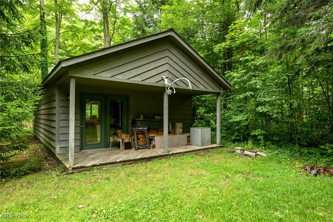 7061 Cascade Road Painesville, OH 44077 - Photo 48 of 49 View of outdoor structure featuring a lawn