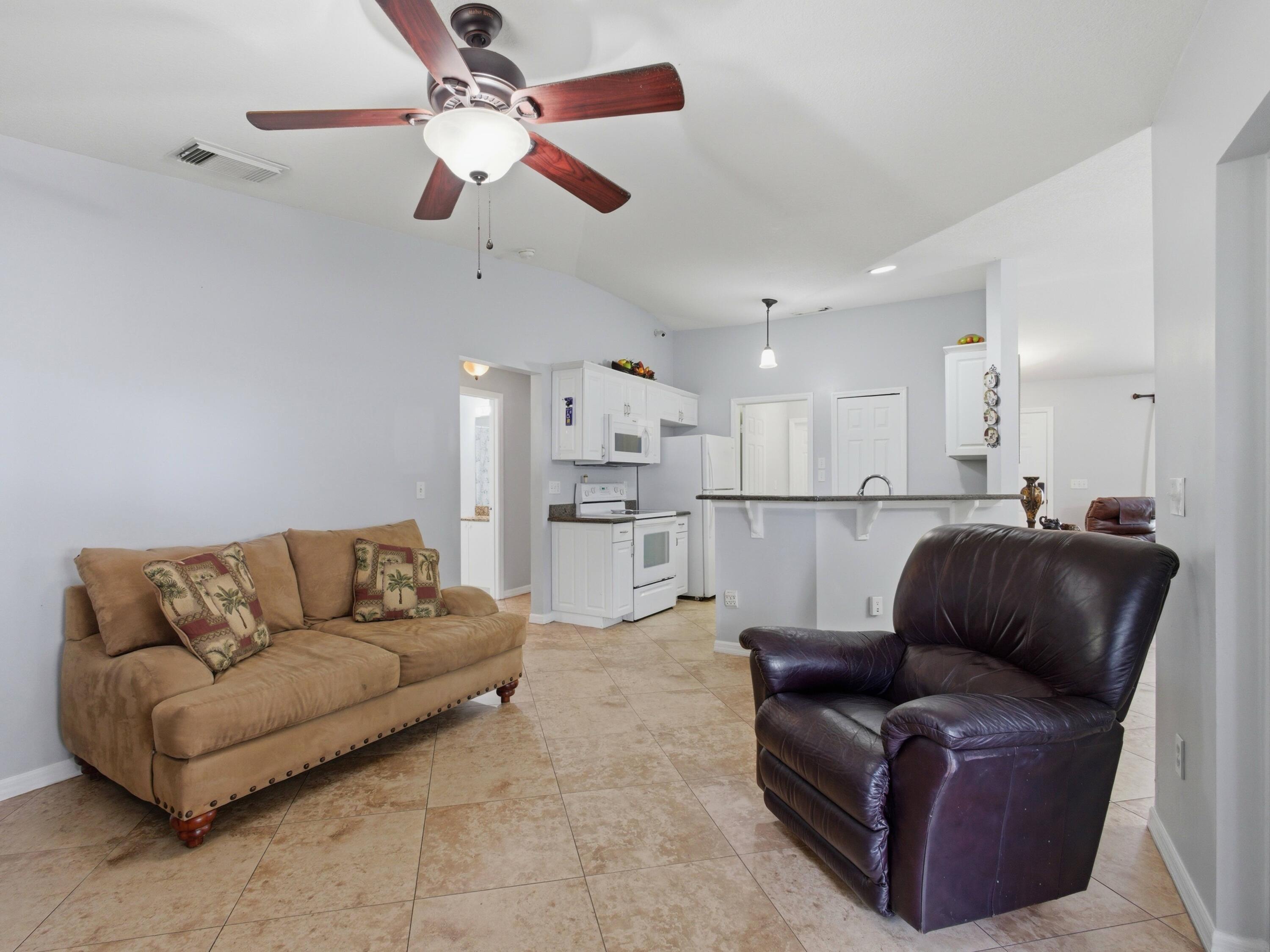 731 Southwest Bond Road Port St. Lucie, FL 34953 - Photo 20 of 31 Family Kitchen