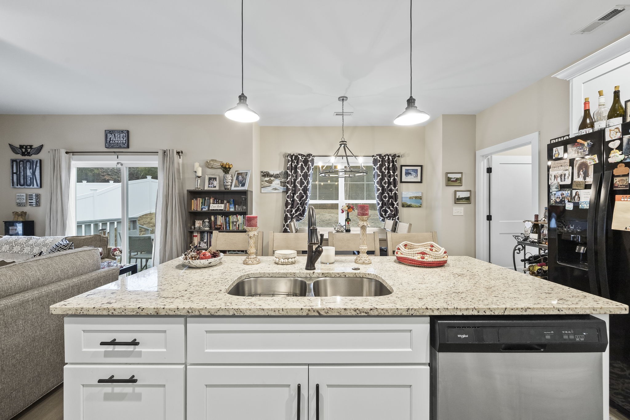 1007 Sycamore Ridge East Burns, TN 37029 - Photo 12 of 28 a kitchen with granite countertop stainless steel appliances a sink and a counter in it