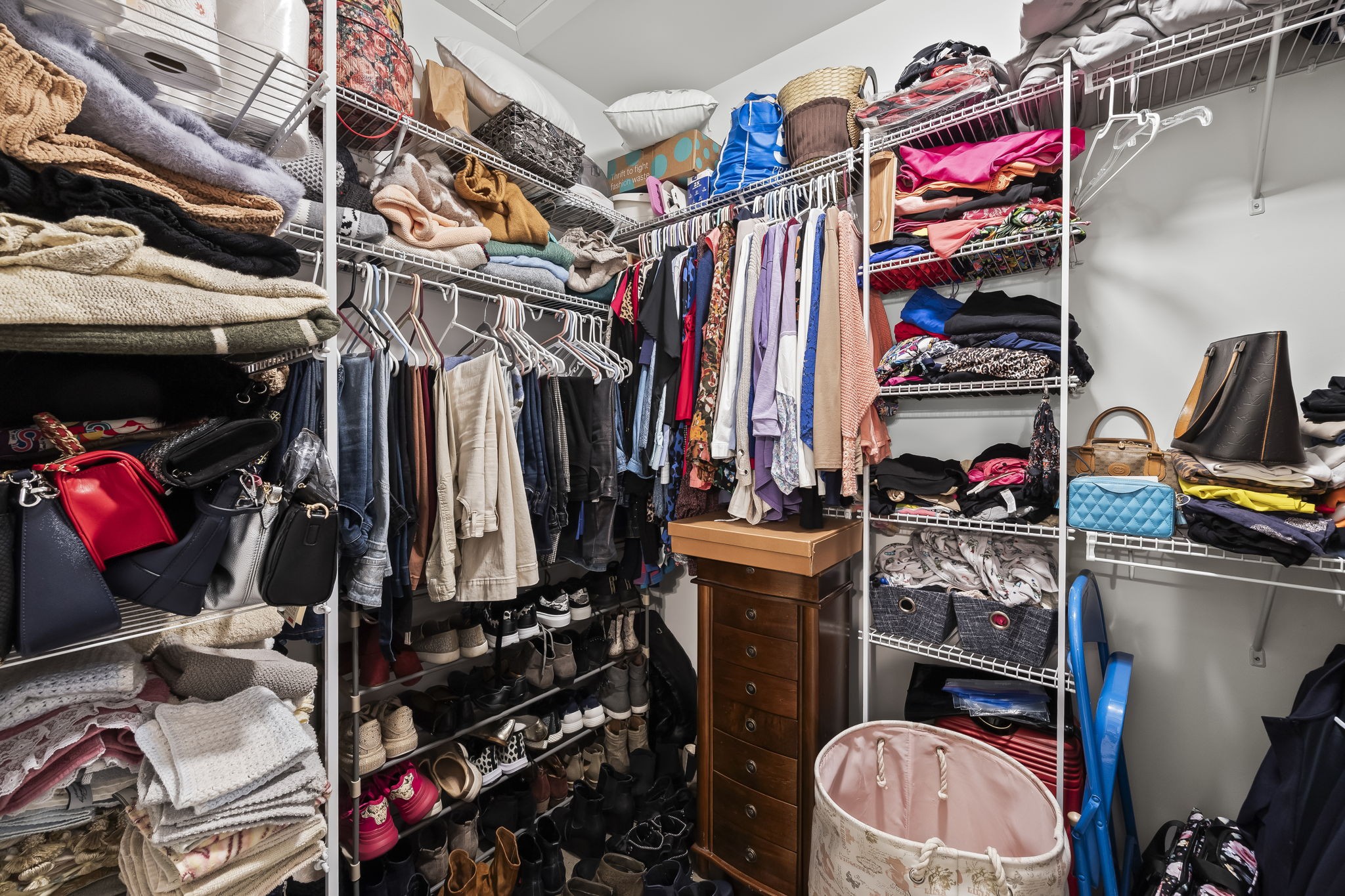 1007 Sycamore Ridge East Burns, TN 37029 - Photo 20 of 28 a view of walk in closet with clothes and shoes
