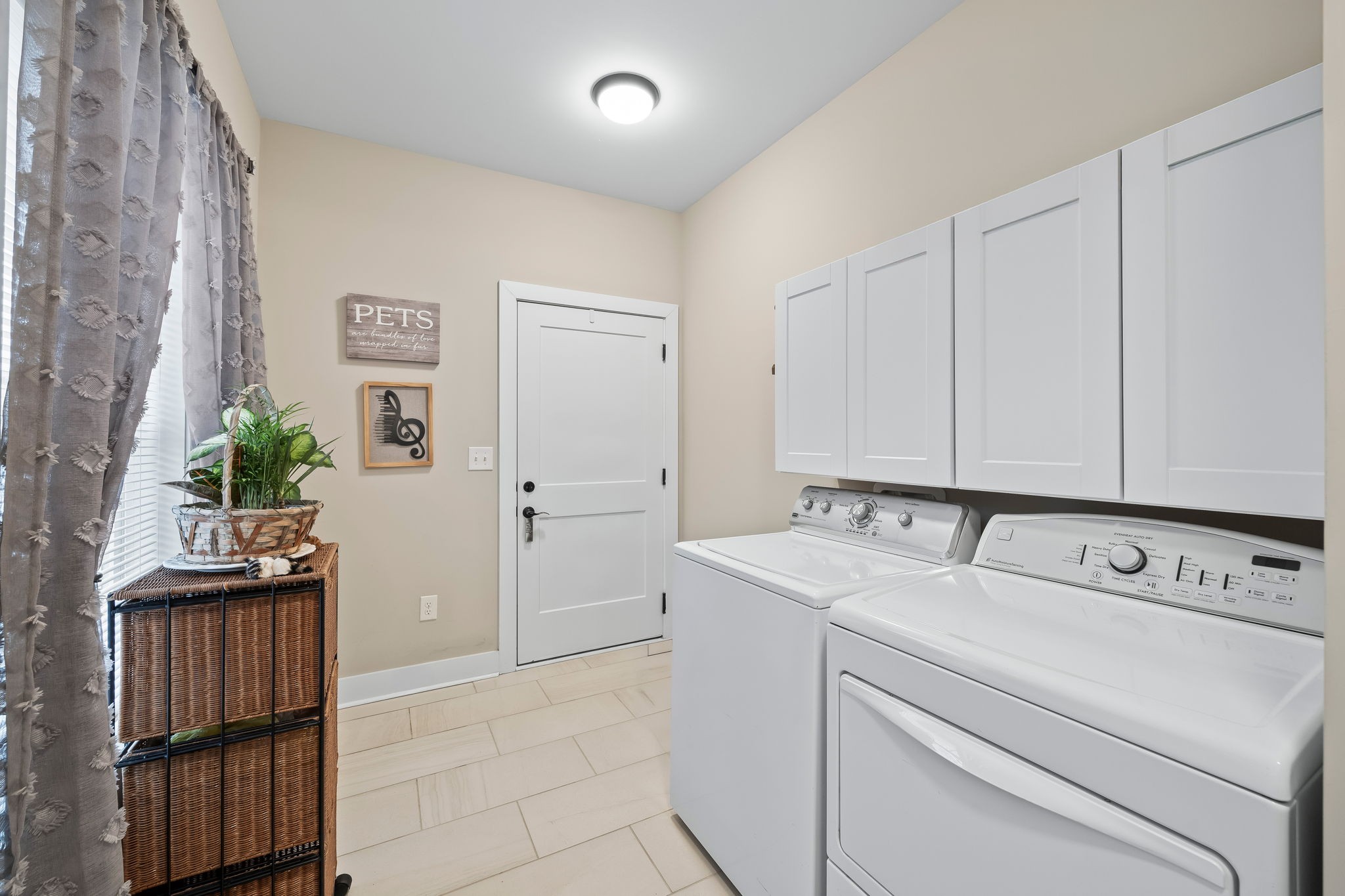 1007 Sycamore Ridge East Burns, TN 37029 - Photo 23 of 28 a view of storage and utility room with washer and dryer