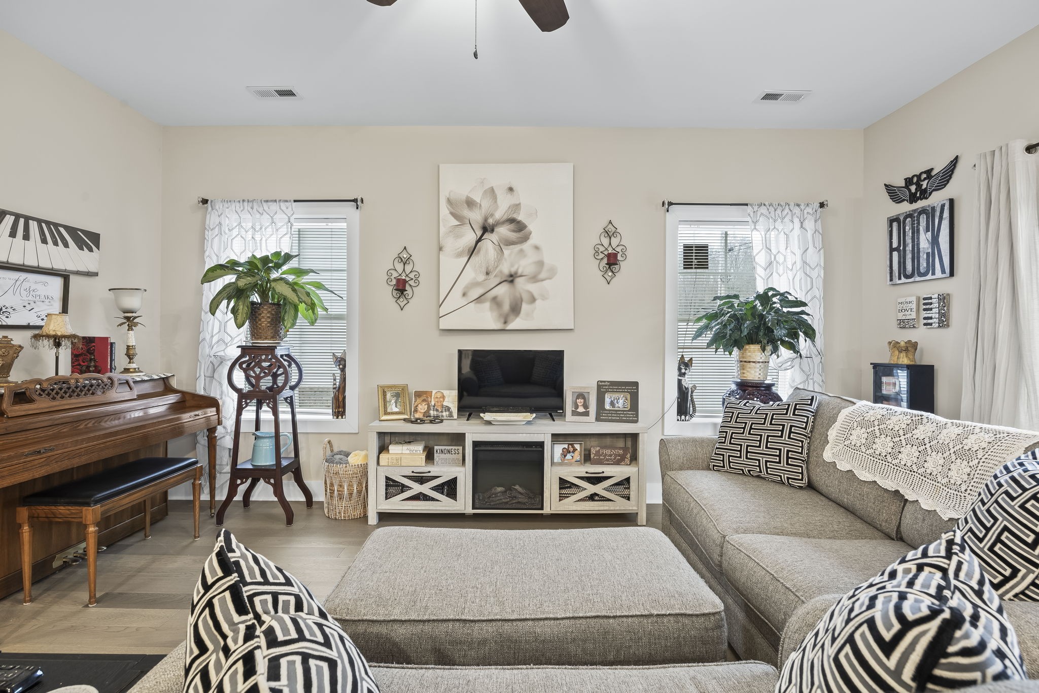 1007 Sycamore Ridge East Burns, TN 37029 - Photo 7 of 28 a living room with furniture a fireplace and a flat screen tv