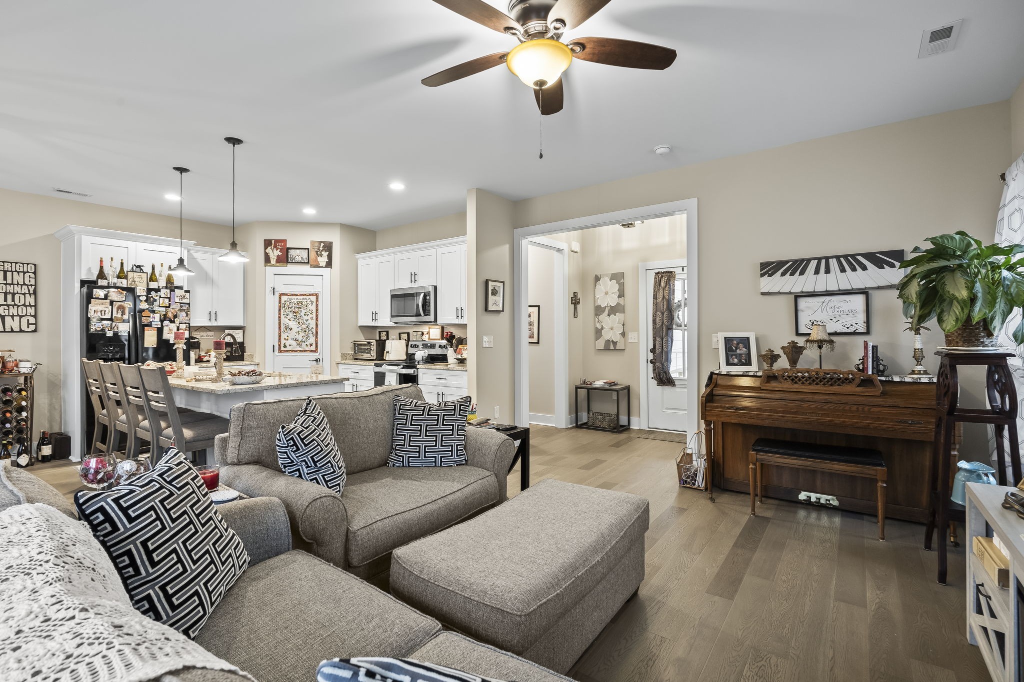 1007 Sycamore Ridge East Burns, TN 37029 - Photo 8 of 28 a living room with furniture and a chandelier