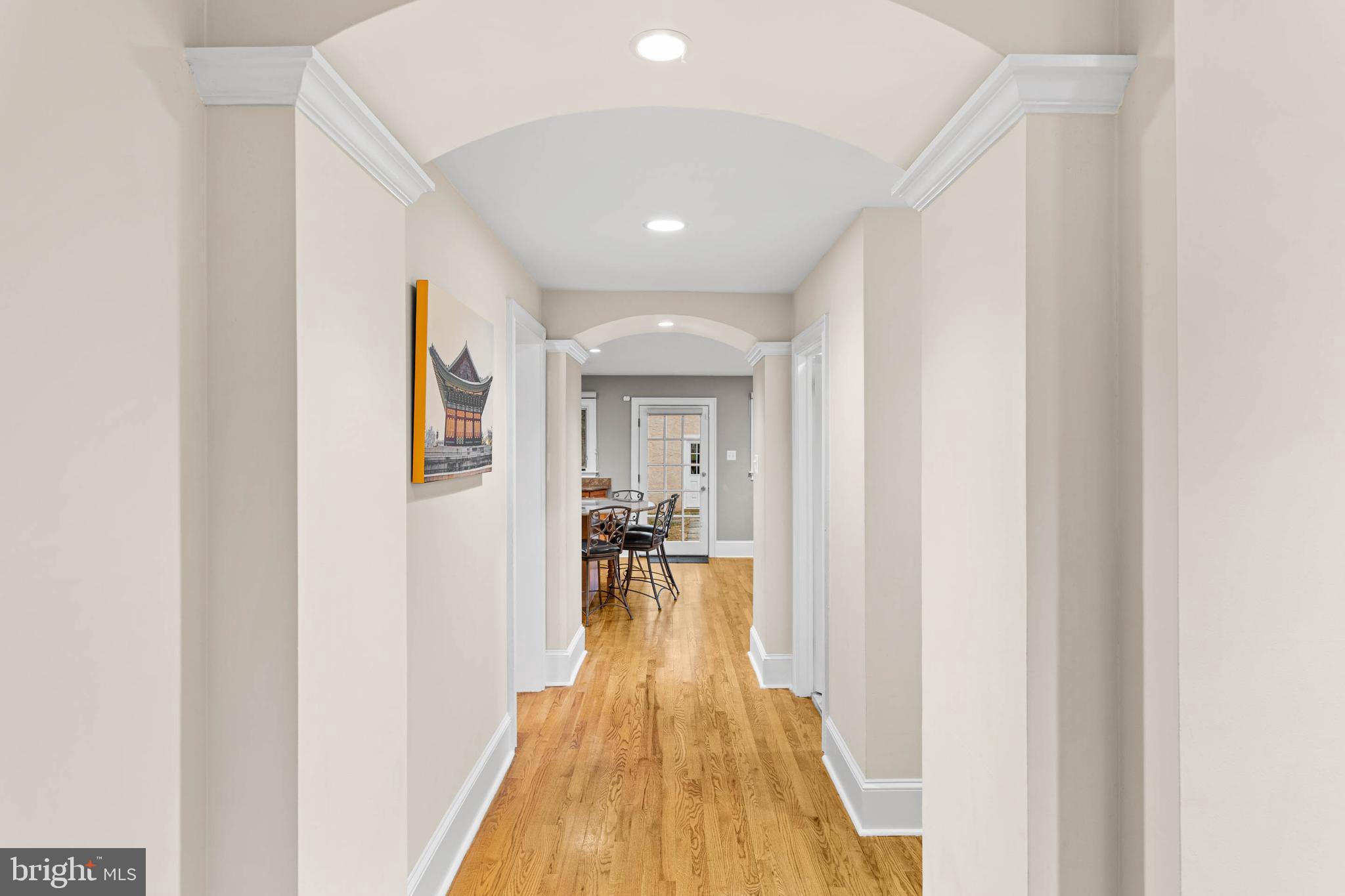 214 Roberts Road Ardmore, PA 19003 - Photo 17 of 63 a view of a hallway with wooden floor and furniture