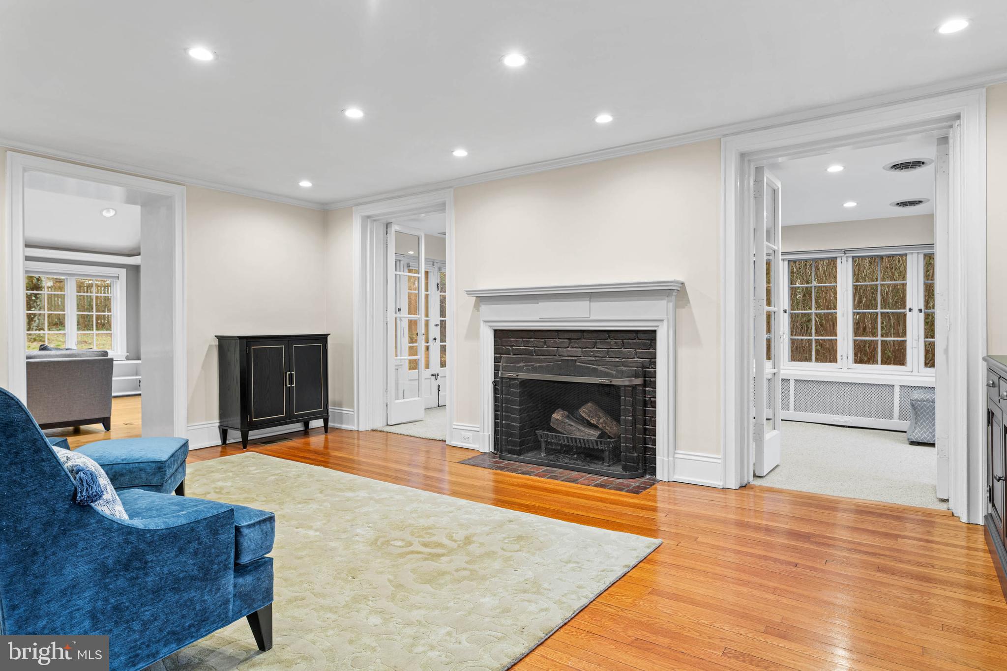 214 Roberts Road Ardmore, PA 19003 - Photo 3 of 63 a living room with furniture and a fireplace