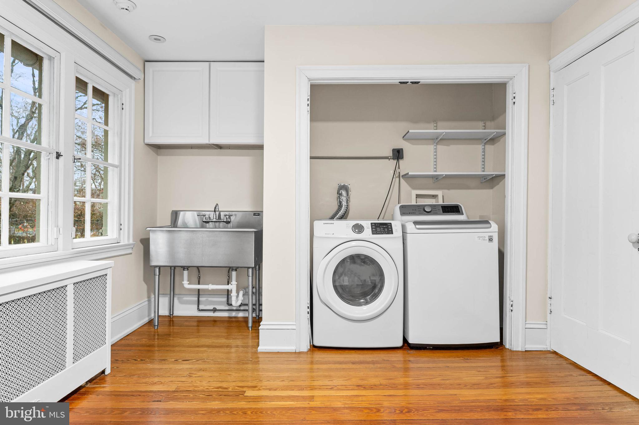214 Roberts Road Ardmore, PA 19003 - Photo 36 of 63 a utility room with sink dryer and washer