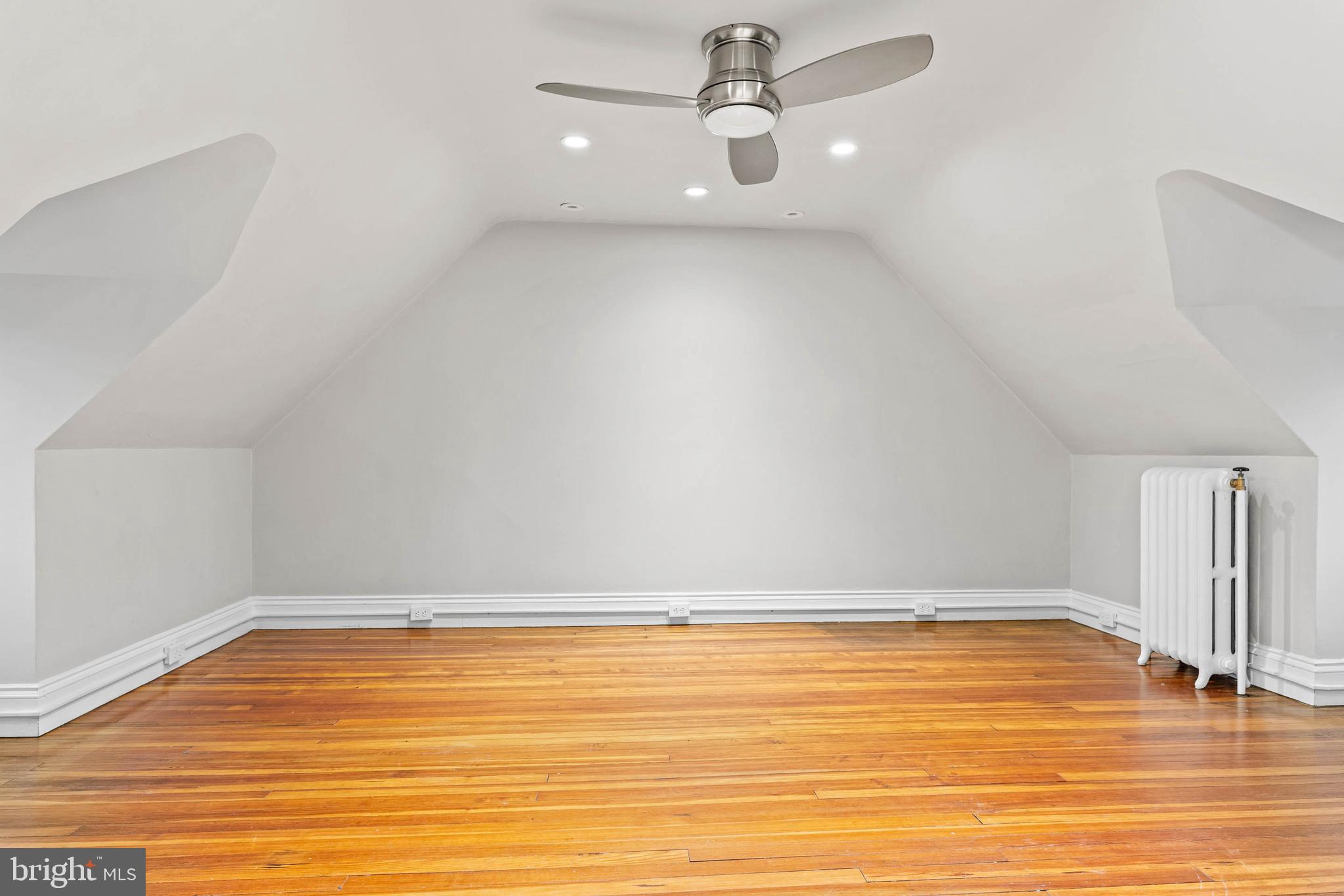 214 Roberts Road Ardmore, PA 19003 - Photo 38 of 63 a view of an empty room with wooden floor