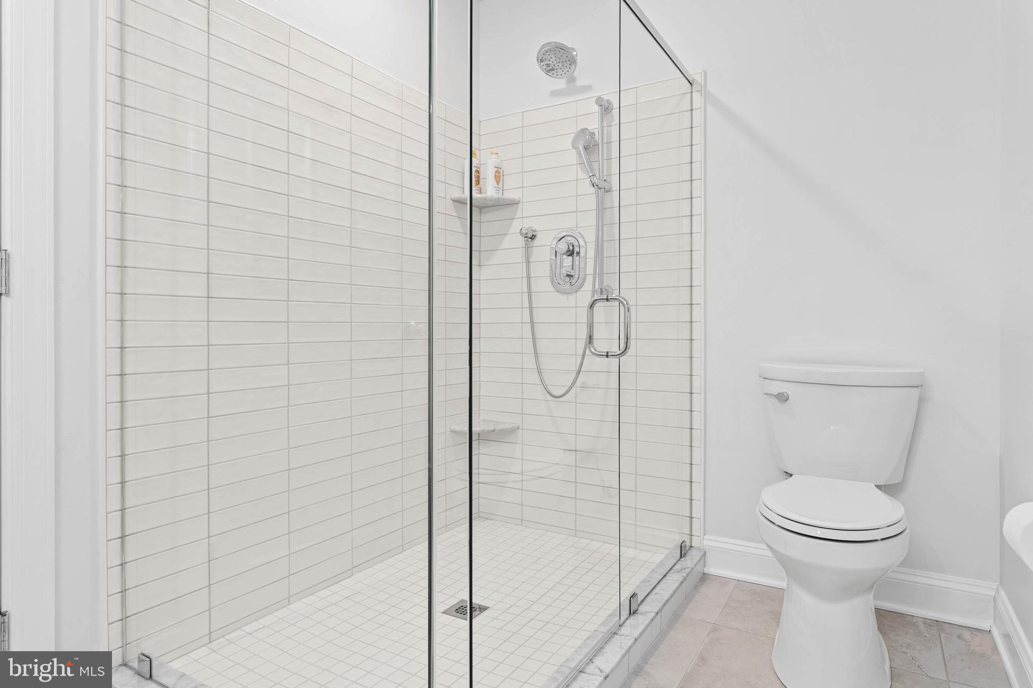 214 Roberts Road Ardmore, PA 19003 - Photo 47 of 63 a bathroom with a toilet and shower