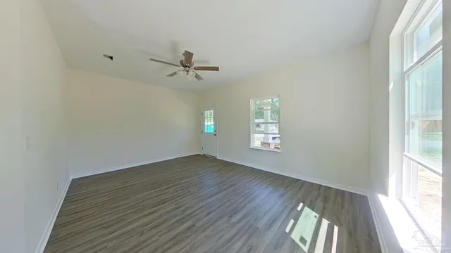 an empty room that has a window
