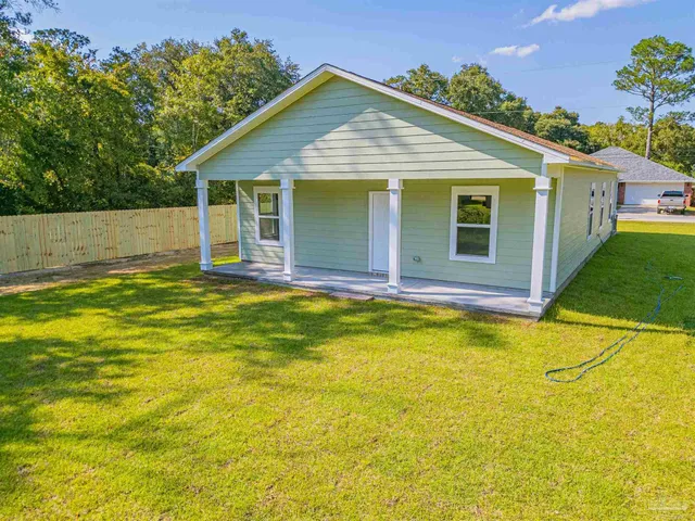 a view of a house with a swimming pool