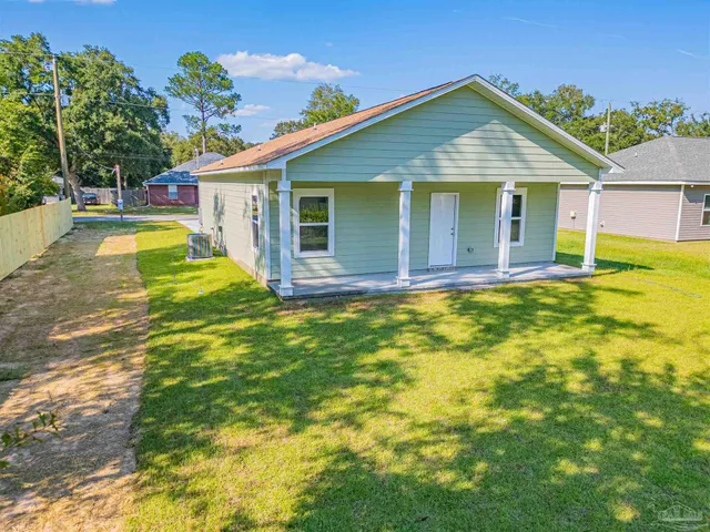 a view of a house with a swimming pool