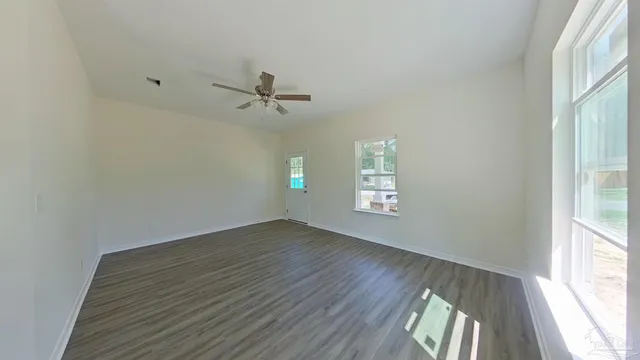 an empty room that has a window