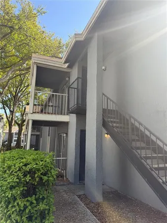 a view of outdoor space and front view of a house