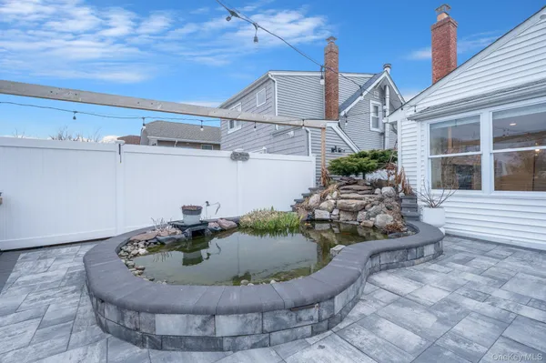 an aerial view of residential building and parking space