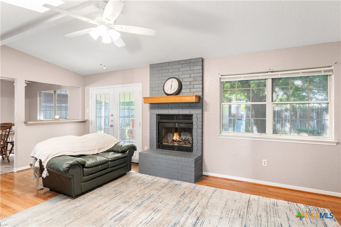 144 Jordan Loop Nolanville, TX 76559 - Photo 11 of 20 a bedroom with a bed and a fireplace