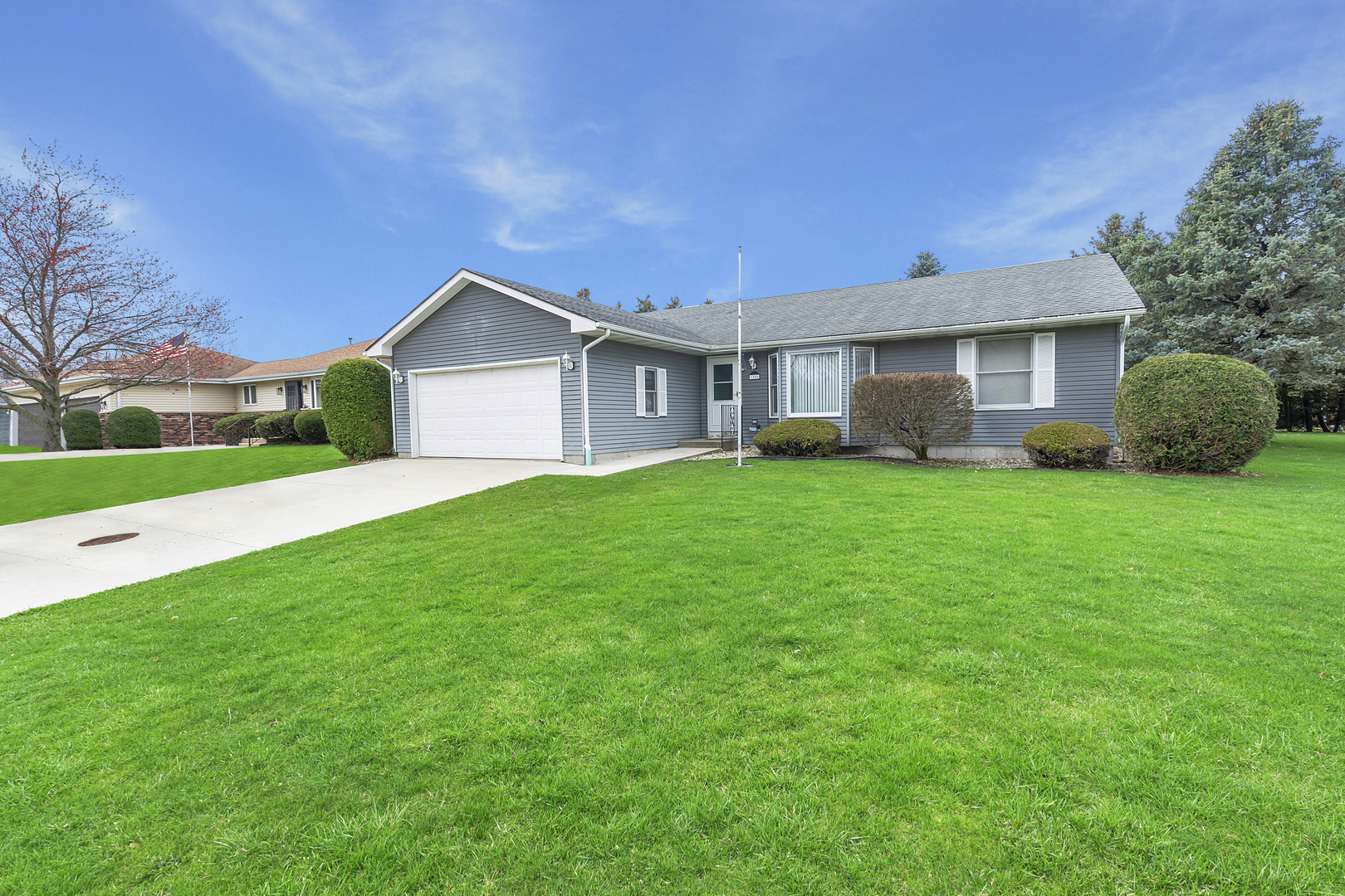 1200 2nd Street Harvard, IL 60033 - Photo 1 of 22 a view of a house with a yard and a large tree