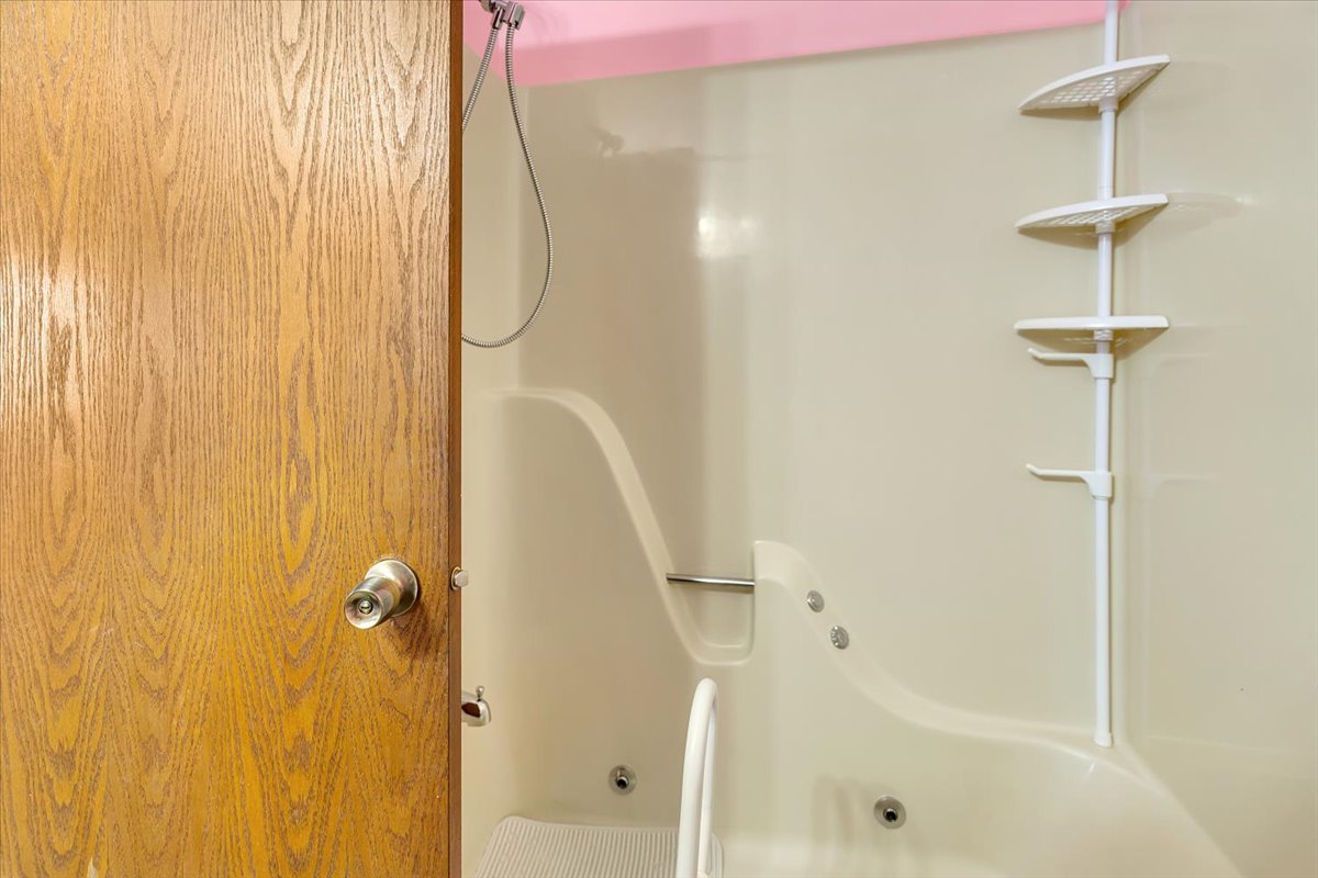 1200 2nd Street Harvard, IL 60033 - Photo 7 of 22 a bathroom with a shower